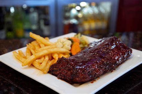 1/2 Rack Ribs - Main Menu - Tom Kelly's - Bar & Grill in New Lenox, IL