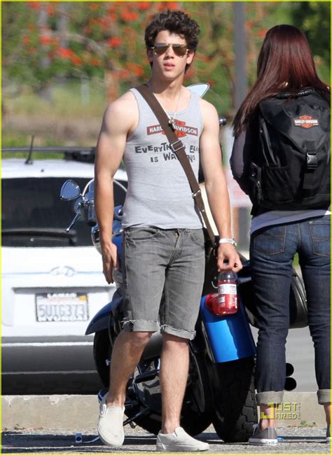 Male Unstripped: Nick Jonas Flaunts Muscle Arm