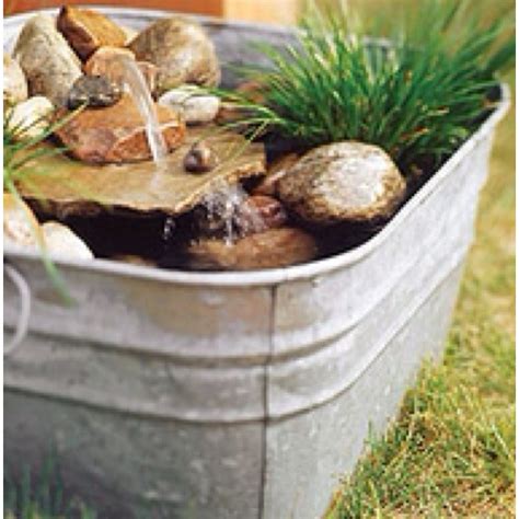 Cool metal pale water feature | Diy water feature, Water features in ...