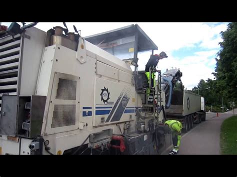 Asphalt milling machine in operation. - YouTube