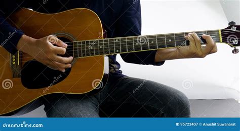 Play a guitar chord Csus4 stock image. Image of sound - 95723407