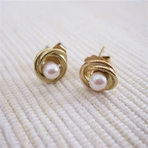 Items similar to VINTAGE Pearl Lover's Knot Earrings in 14K Yellow Gold on Etsy