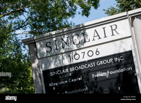 A logo sign outside of the headquarters of the Sinclair Broadcast Group ...