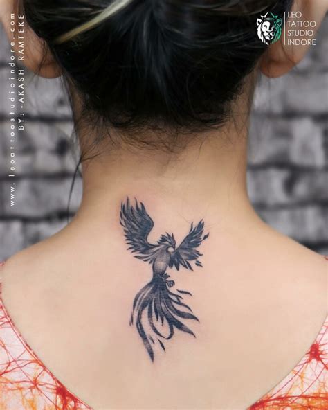 Details 78+ phoenix bird tattoo on back latest - in.coedo.com.vn