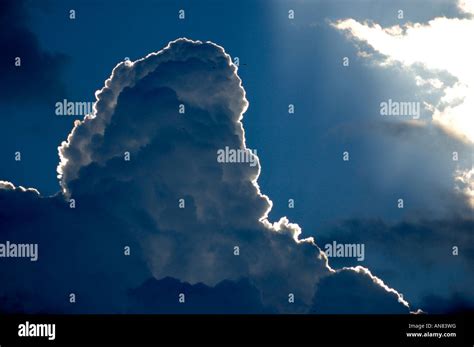 Cumulus storm clouds with a silver lining Stock Photo - Alamy