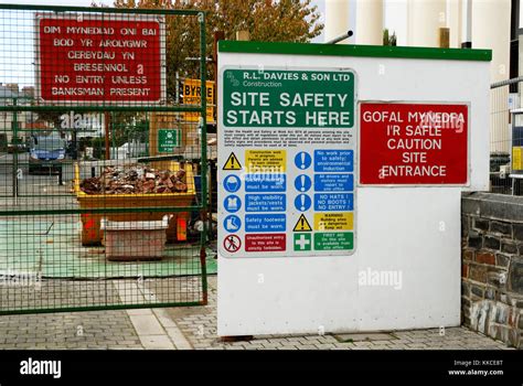 Site Safety signs at the entrance to a construction site, Wales Stock ...