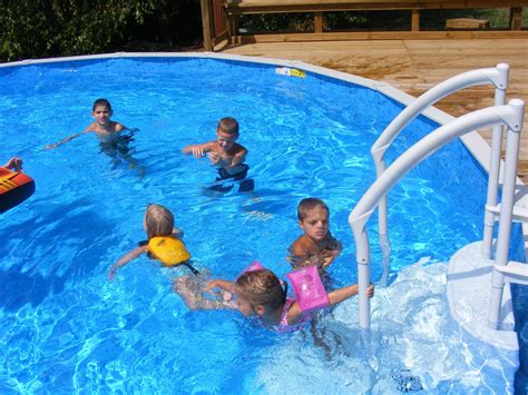 Blessed By A Child: A pool full of kids....2 pools full of kids....3 if you count the baby pool :)