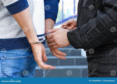 Police Officer Putting Handcuffs on Criminal, Closeup Stock Image - Image of offender, male ...