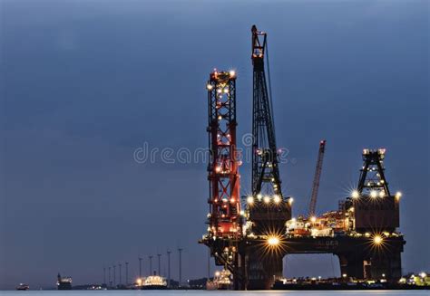 Largest Crane Vessel in the World in Rotterdam Port by Night Stock ...