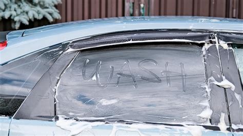 Premium Photo | Car wash the machine asks to be washed the machine is doused with foam