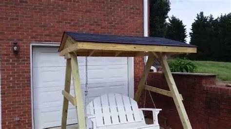 Porch swing frame with a roof. - YouTube