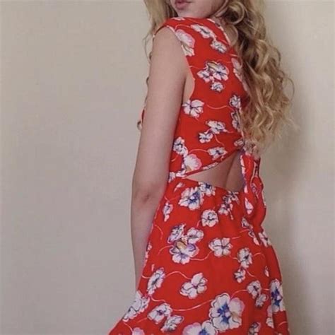 red floral dress with a back cutout, super cute and... - Depop