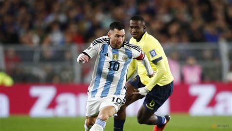 Messi magic earns Argentina win over Ecuador in World Cup qualifier - CNA