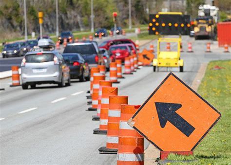 Work Zone Driving Rules: Road Signs, Channeling Devices & Flagger Signals