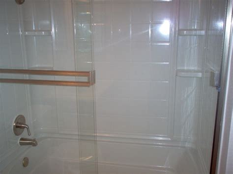 Fiberglass 4 piece combo tub/shower with Brushed Nickel Fixtures ...