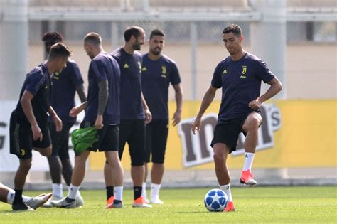 Juventus' Portuguese forward Cristiano Ronaldo (R) takes part in a ...