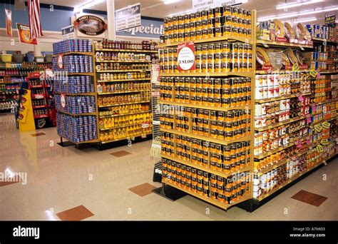 End cap displays at the end of the aisle in a grocery store Stock Photo - Alamy