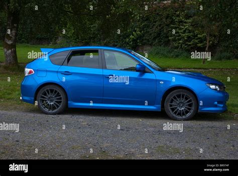 Metallic blue subaru impreza wrxs hatchback hi-res stock photography ...