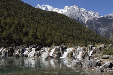 Natural Scenery Mountains Forests And Lakes Background, Blue Sky ...