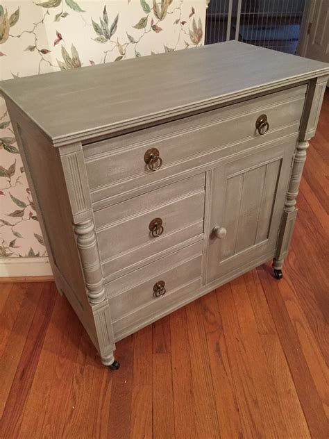 Antique cabinet painted with Annie Sloan French Linen then dry brushed with a mix of French ...