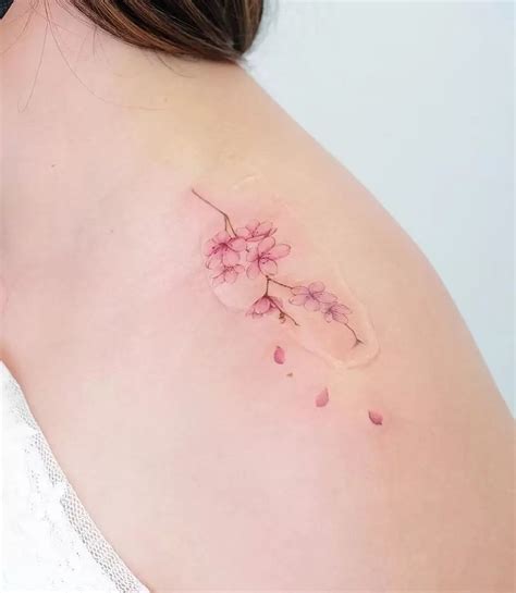 Sakura tattoo ideas | Sakura tattoo, Shoulder tattoo, Tattoos