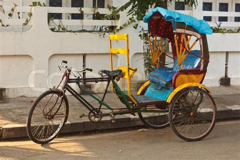 Empty bicycle rickshaw in street. ... | Stock image | Colourbox