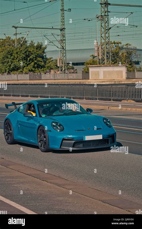 porsche 911 carrera blue Stock Photo - Alamy