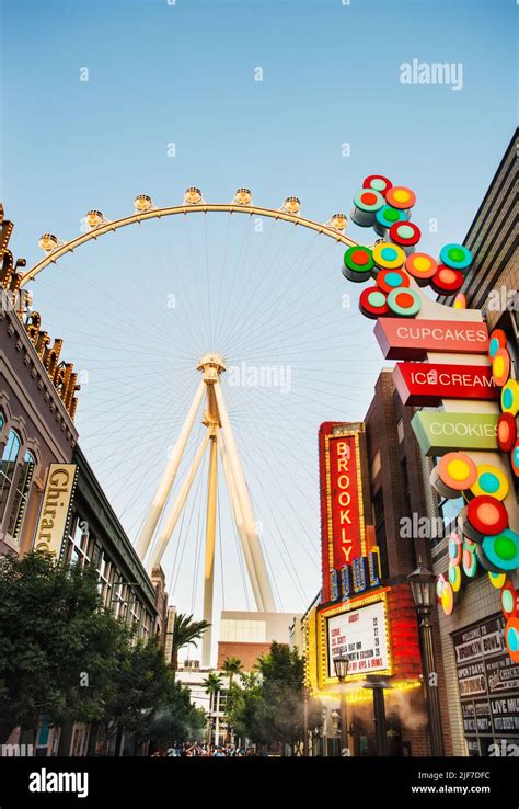 The Las Vegas Ferris wheel surrounded by shops and hotels, Las Vegas Strip, Las Vegas Nevada ...