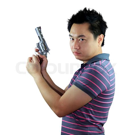 Man holding gun | Stock image | Colourbox