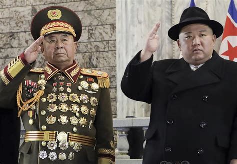 A heavily-awarded North Korean general salutes next to Kim Jong Un at a military parade, 8 Feb ...