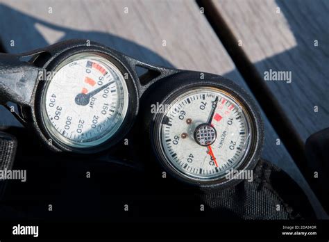 Scuba diving pressure and depth gauge close up Stock Photo - Alamy