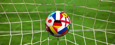 Premium Photo | Soccer ball in the net of a goal soccer concept