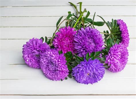 Premium AI Image | bouquet of flowers on white wooden table