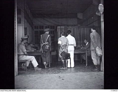 AMBOINA, AMBON ISLAND 1945-09-22. OCCUPATION OF AMBOINA BY THE 33RD ...