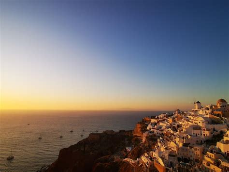 Premium Photo | Aerial view of oia during sunset