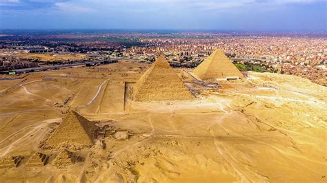 Aerial landscape view of Giza pyramids in Egypt shot by drone Photograph by Islam Moawad | Pixels