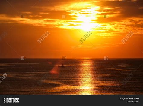 Ocean Sunset Boats Sea Image & Photo (Free Trial) | Bigstock