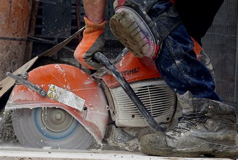 Worker With Power Cutting Tool Free Stock Photo - Public Domain Pictures