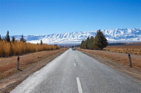 Premium Photo | Road leading to snow atlas mountains