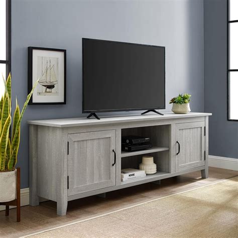 Walker Edison Furniture Company 70 in. Stone Grey Composite TV Stand with Storage Doors (Max tv ...