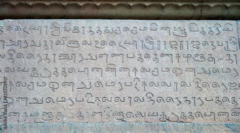 Inscriptions of Tamil language carved on the stone walls at ...