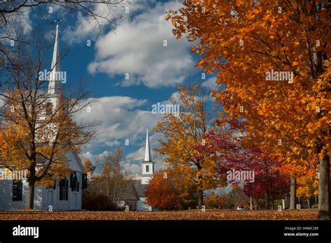 Fall foliage explodes on the New Salem town common with church steeples ...