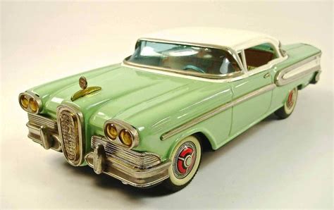 40 best Vintage Tin Cars images on Pinterest | Vintage tins, Tin toys ...