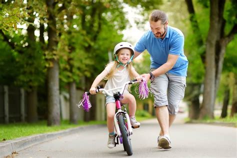 Como ensinar uma criança a andar de bicicleta