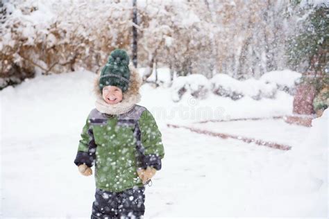 Cute Child Playing in a Snow. Winter Activities for Kids. Stock Image - Image of cold, forest ...