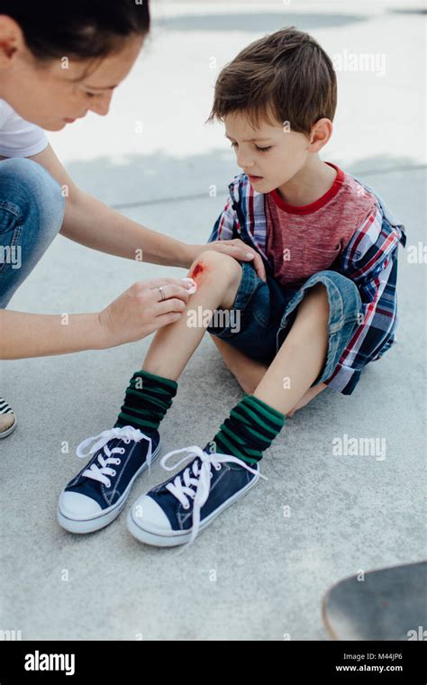 Scraped knee hi-res stock photography and images - Alamy