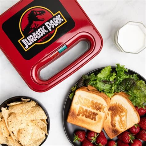 Uncanny Brands Jurassic Park Grilled Cheese Maker- Panini Press and Compact Indoor Grill, 1 ...