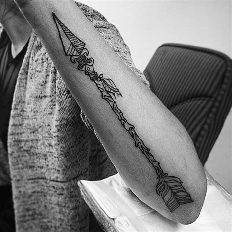 Fantastic black indian arrow tattoo for boys - Tattooimages.biz