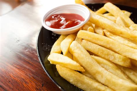 French fries with ketchup. stock photo. Image of yellow - 48782620