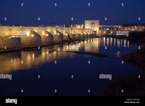 Roman Bridge at night Stock Photo - Alamy